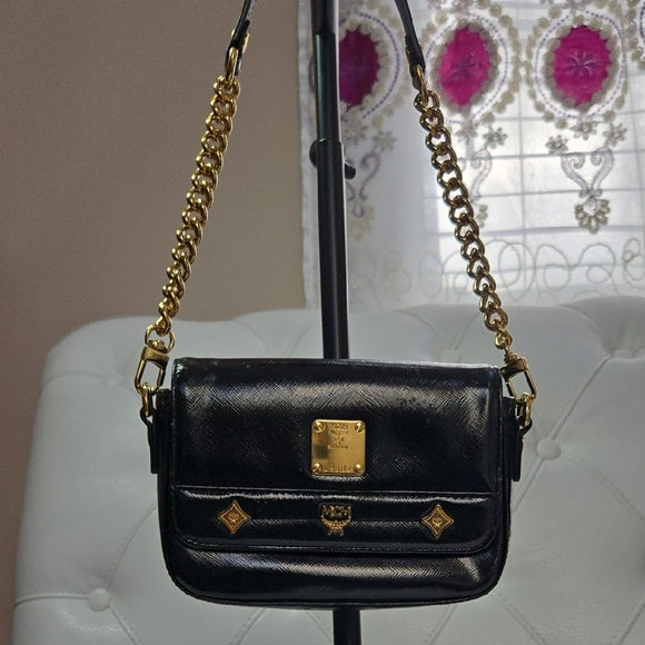 MCM Handbags - black MCM Mini crossbody bag with gold-plated hardware.